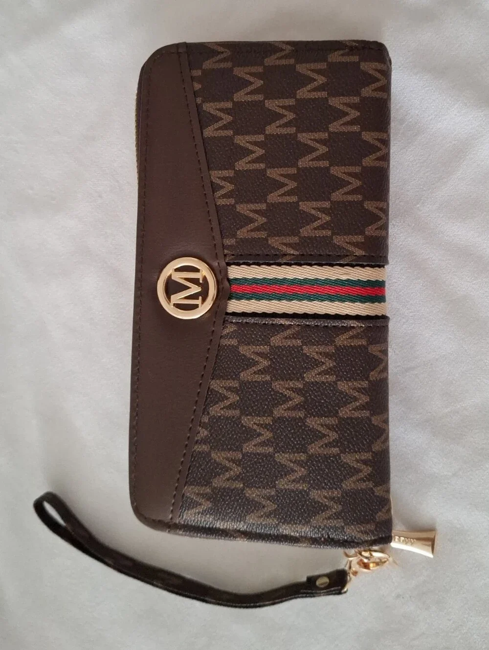 Brown Monogram Wristlet Wallet with Striped Accent and Gold Logo
